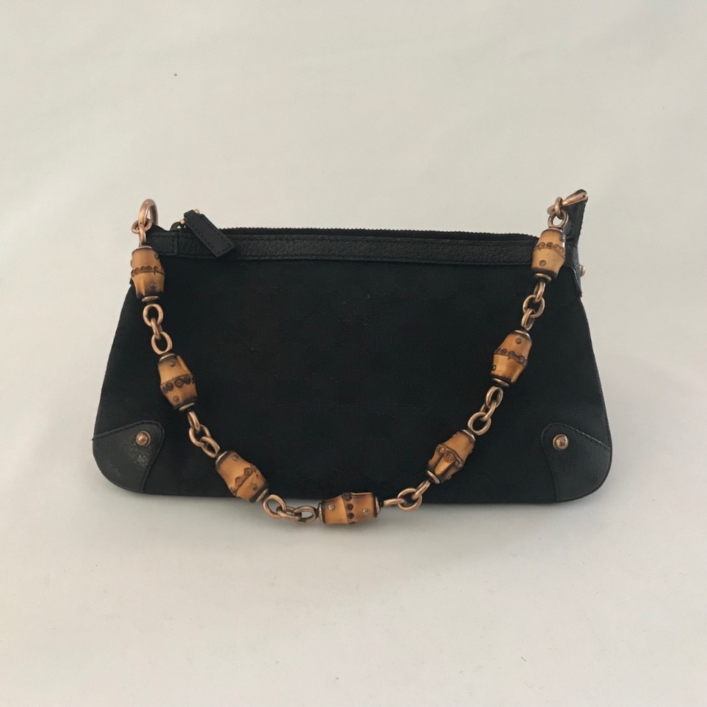 Gucci signature monogram limited ed pochette
